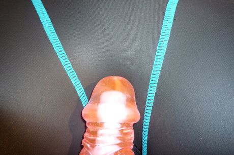 she takes off her bikini and heels and toys her pussy with a dildo