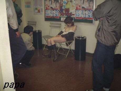 Amateur Asian girl strips naked and shows her hairy pussy in the park