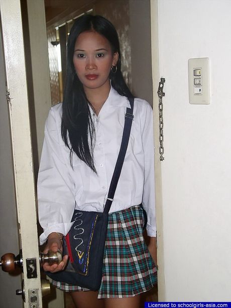 Shy Asian schoolgirl flashing the pinky inside of her brown pussy