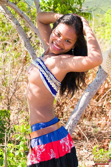 Teen Asha lifts her India skirt and exposes brown nipples