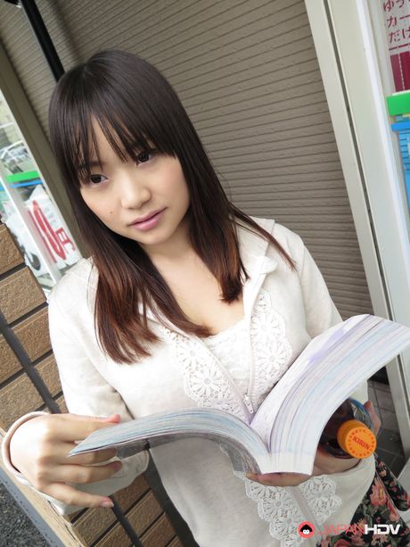 Busty Mikoto Mochida sucks a strangers cock outdoors