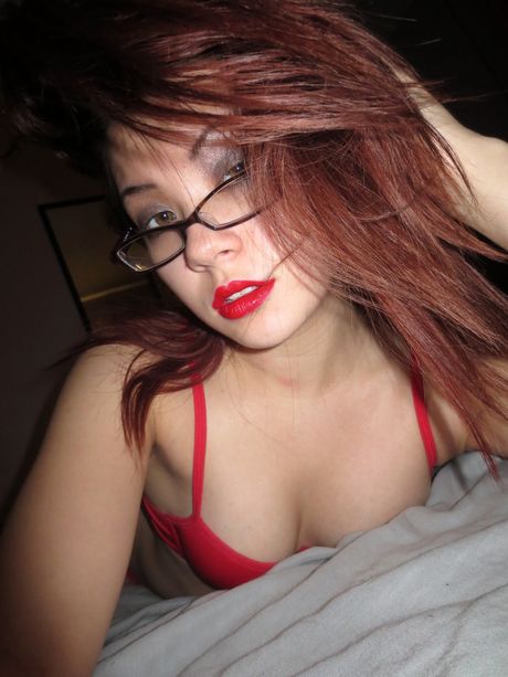 Asian babe Sydney Mai strips and shows her amazing melons and pussy in a solo