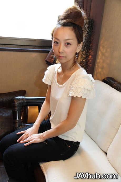 Skinny Japanese babe Kinomi strips and shows her tiny tits and pussy