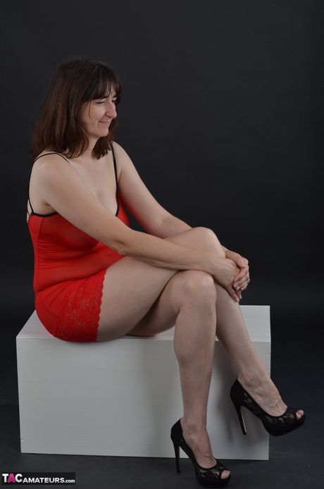 Asian babe with teen tits strips and shows her curves