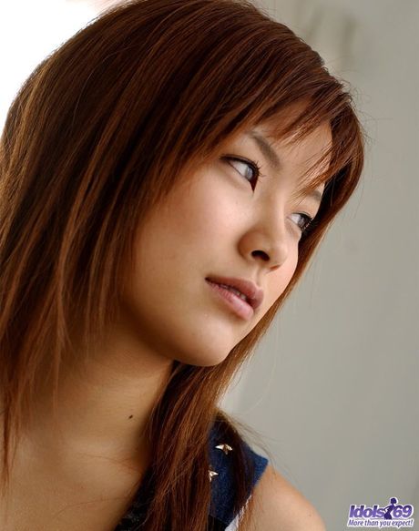 Stunning Asian teen Kana strips and shows her tiny tits and ass in a solo