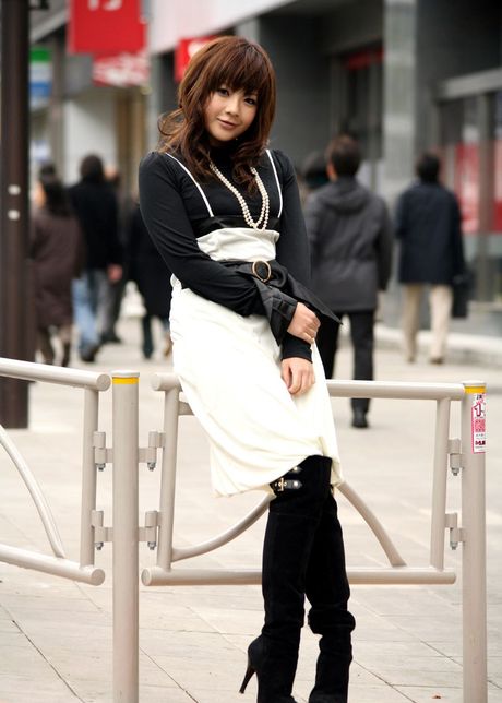 Asian trollop dreams of being a sexual object of lust as she poses for pictures