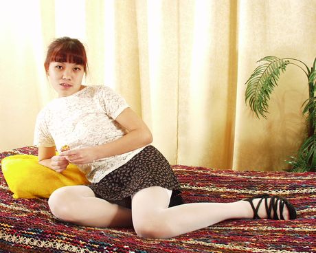 Japanese amateur chick with tiny tits toying her hairy pussy with a dildo