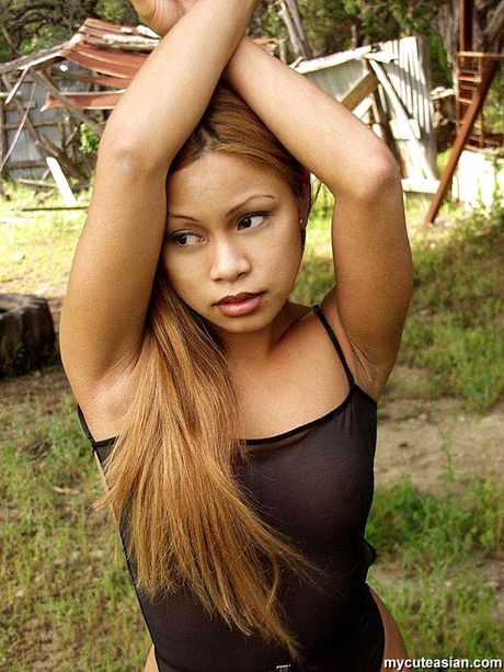 Superb Asian amateur girl strips and shows her tiny tits and ass in a solo