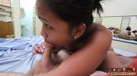 Asian granny Rubi gets her hairy cunt drilled by a young stud