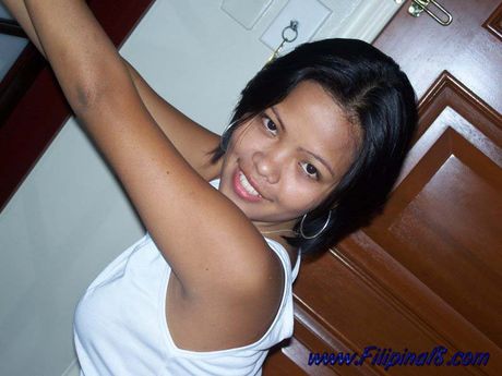 Asian teenager with small tits and a nice ass strips and exhibits nudity