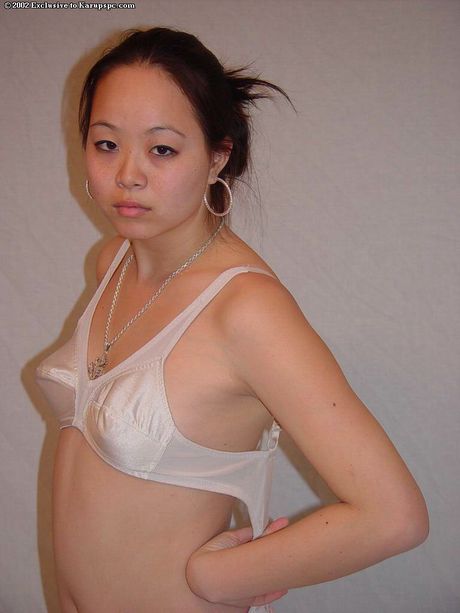 Excellent oriental youthful China in shorts exposes tiny tits and jerks off